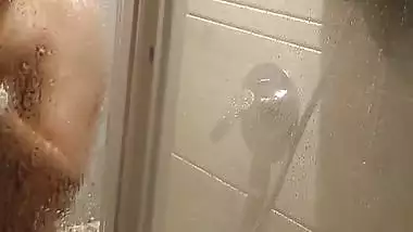 Nude MMS of a young lady taking an erotic shower