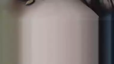 Desi model with pierced nostril takes camera and films her XXX slit