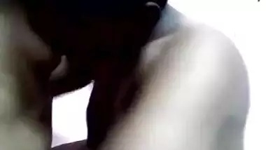 Amateur video of the Indian man kissing wife's tits before sex