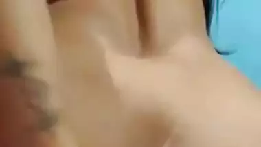 Cute Indian beauty showing off her ass and fingering cunt